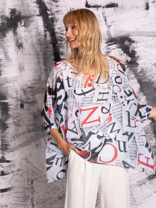 Capri Poncho in NonFiction - In Stock