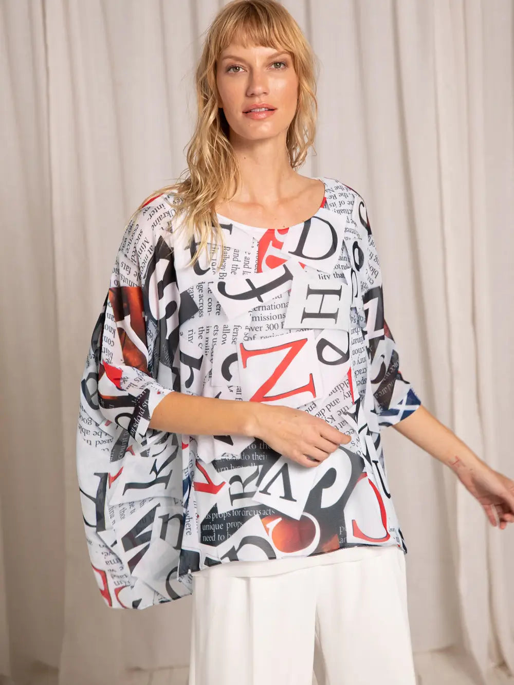 Capri Poncho in NonFiction - In Stock